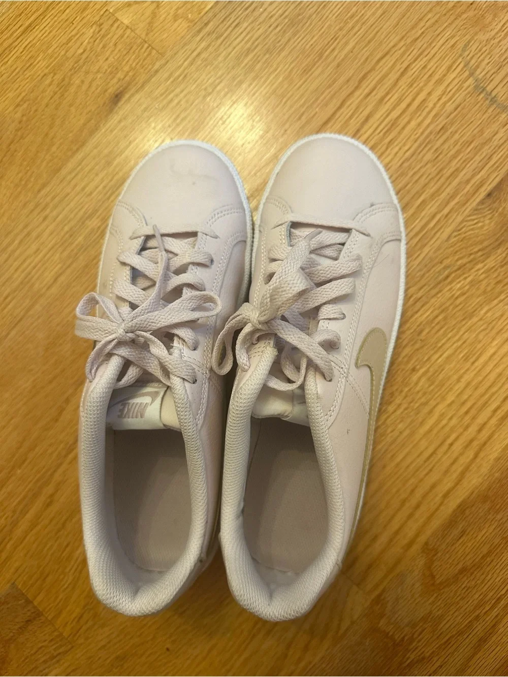 Nike Pale Pink Leather Low-Top Sneakers with Cream Swoosh